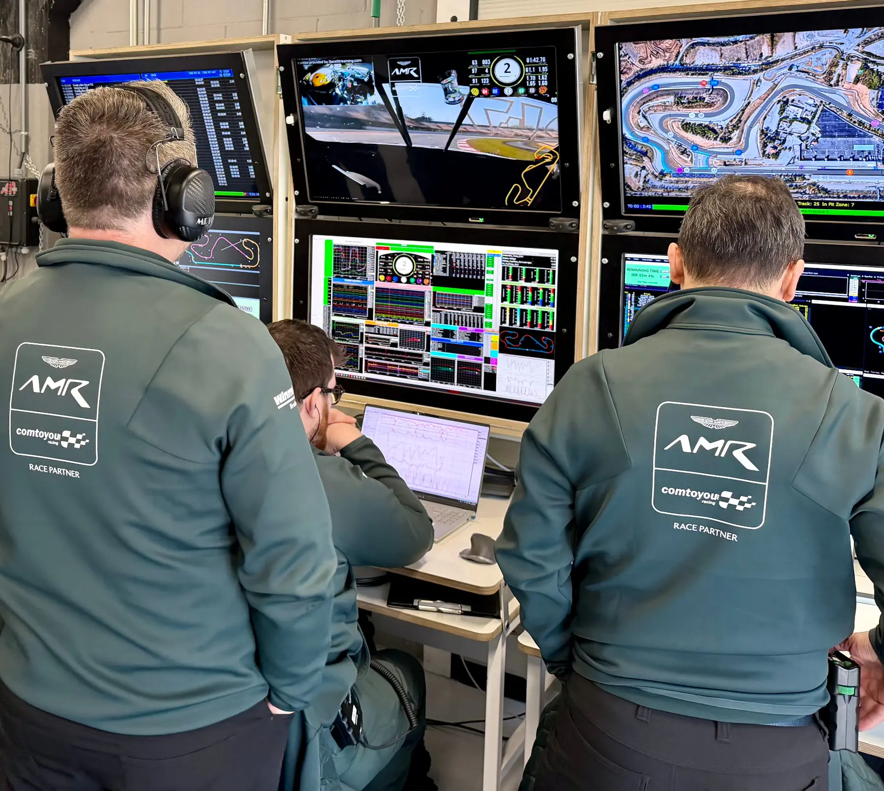 Race engineer reviewing live telemetry